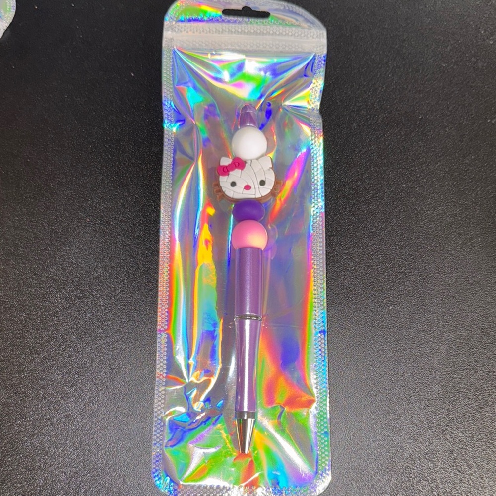 Purple and Pink Character Pen